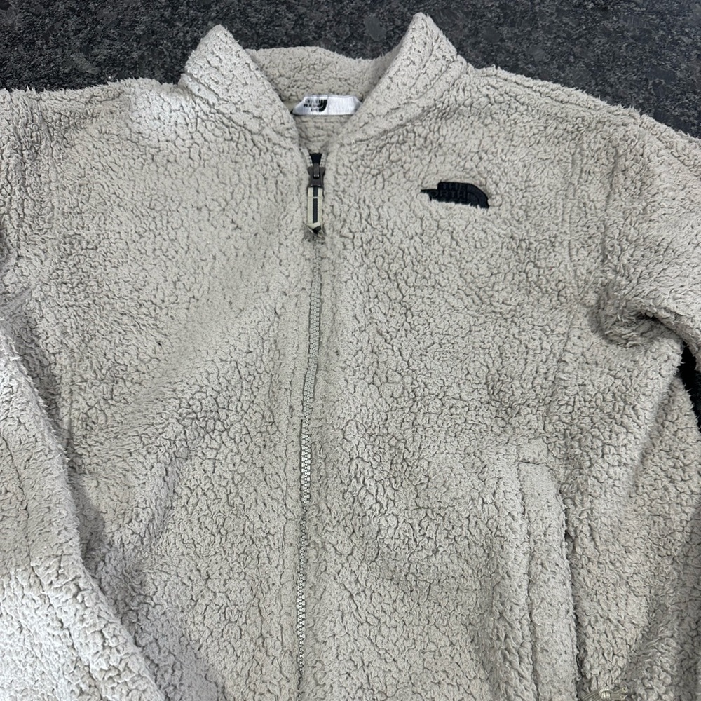 Women zip up northface